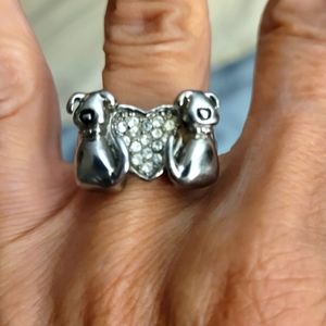2 dogs beside a heart ring size 8